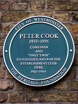 "Peter Cook 1937-1995 comedian and "only twin" co-founded and ran the Establishment Club here 1961-1964" Green plaque erected by City of Westminster Council and (2022)