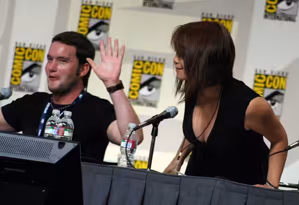 Naoko peers for a better look at what John is up to. (2008)