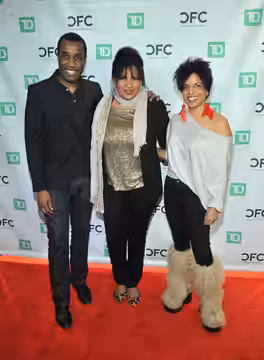 Clement Virgo, Pam Grier and host Sharon Lewis on the red carpet at the Black History Month event "An Evening with Pam Grier". To learn more, please visit: cfcc (2012)