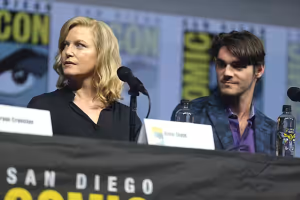 Anna Gunn and RJ Mitte speaking at the 2018 San Diego Comic Con International, for "Breaking Bad 10th Anniversary Reunion", at the San Diego Convention Center i