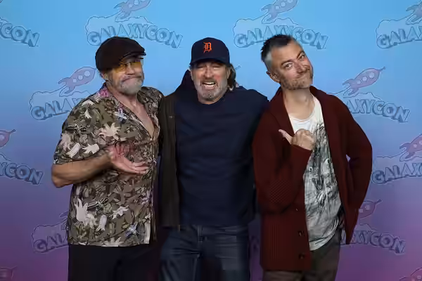 Actors, Michael Rooker, Scott Patterson, and Sean Gunn, take a photo together at GalaxyCon Columbus in 2023.