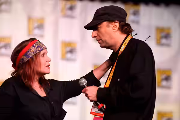 Carrie Fisher &amp; David Mirkin speaking at the 2012 San Diego Comic-Con International in San Diego, California. Please attribute to Gage Skidmore if used else