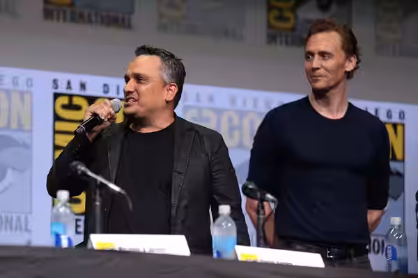 Joe Russo and Tom Hiddleston speaking at the 2017 San Diego Comic Con International, for "Avengers: Infinity War", at the San Diego Convention Center in San Die