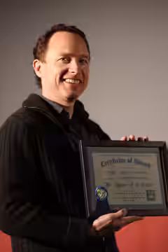 Roger Nygard accepting award (2011)