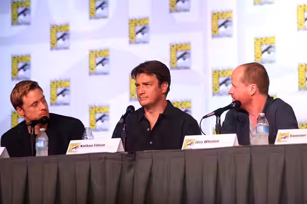 Alan Tudyk, Nathan Fillion &amp; Joss Whedon speaking at the 2012 San Diego Comic-Con International in San Diego, California. Please attribute to Gage Skidmore 