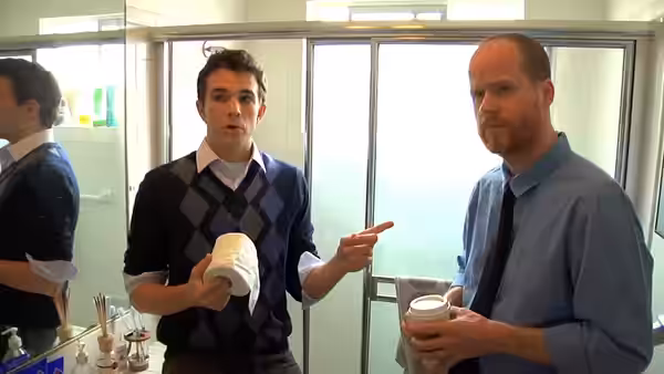 A screenshot from "The Coach (featuring Joss Whedon)", a sketch comedy video posted to YouTube by BriTANicK (2012)