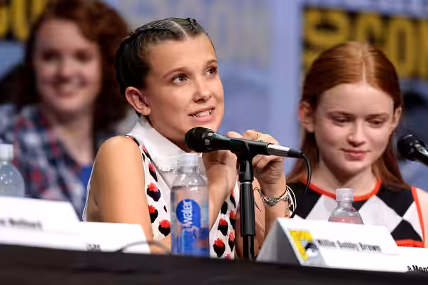 Millie Bobby Brown and Sadie Sink speaking at the 2017 San Diego Comic Con International, for "Stranger Things", at the San Diego Convention Center in San Diego