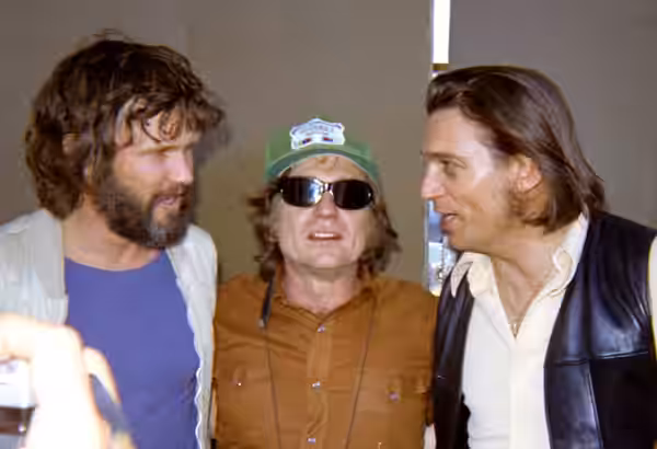Kris Kristofferson, Willie Nelson, Waylon Jennings at Dripping Springs reunion, that later became Willie Nelson's 4th of July picnic. (1972)