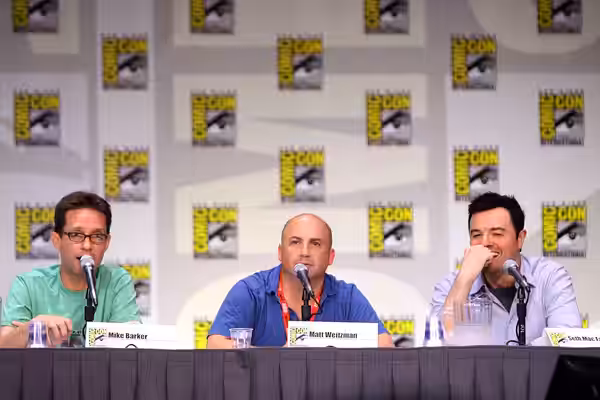 Mike Barker, Matt Weitzman and Seth MacFarlane at the 2011 San Diego Comic-Con International in San Diego, California. Please attribute to Gage Skidmore if used