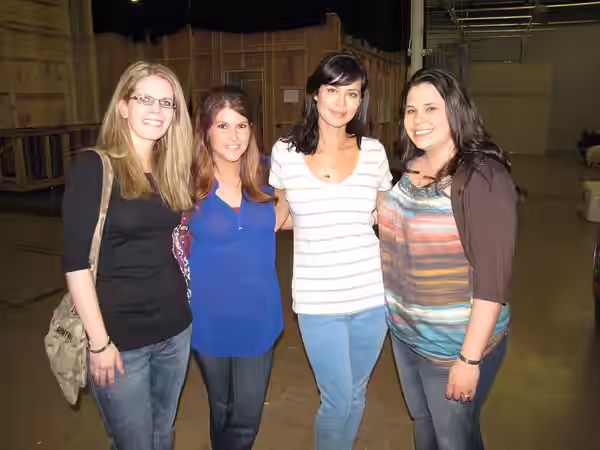 Minnesota Army wives Andrea Curely, Samantha Koktan and Tammy Estes pose with Catherine Bell, who plays Denise Sherwood on Lifetime's "Army Wives", during a vis (2012)