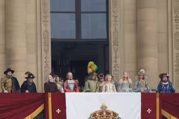 Behind the scenes photo of a balcony shot of the 2011 version of the Three Musketeers, being filmed at the Residenz in Würzburg Bavaria. From left to right: unk (2010)