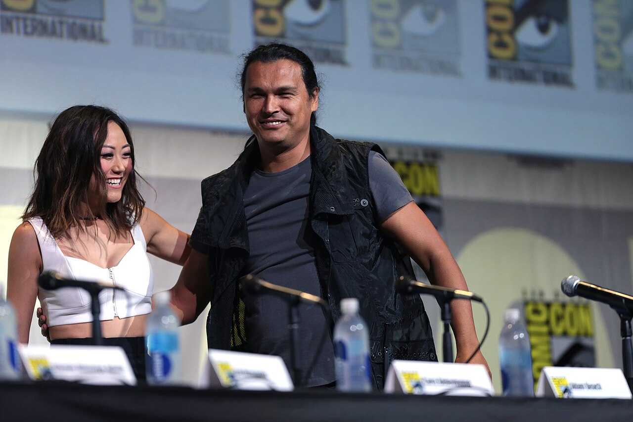 Karen Fukuhara and Adam Beach speaking at the 2016 San Diego Comic Con International, for "Suicide Squad", at the San Diego Convention Center in San Diego, Cali