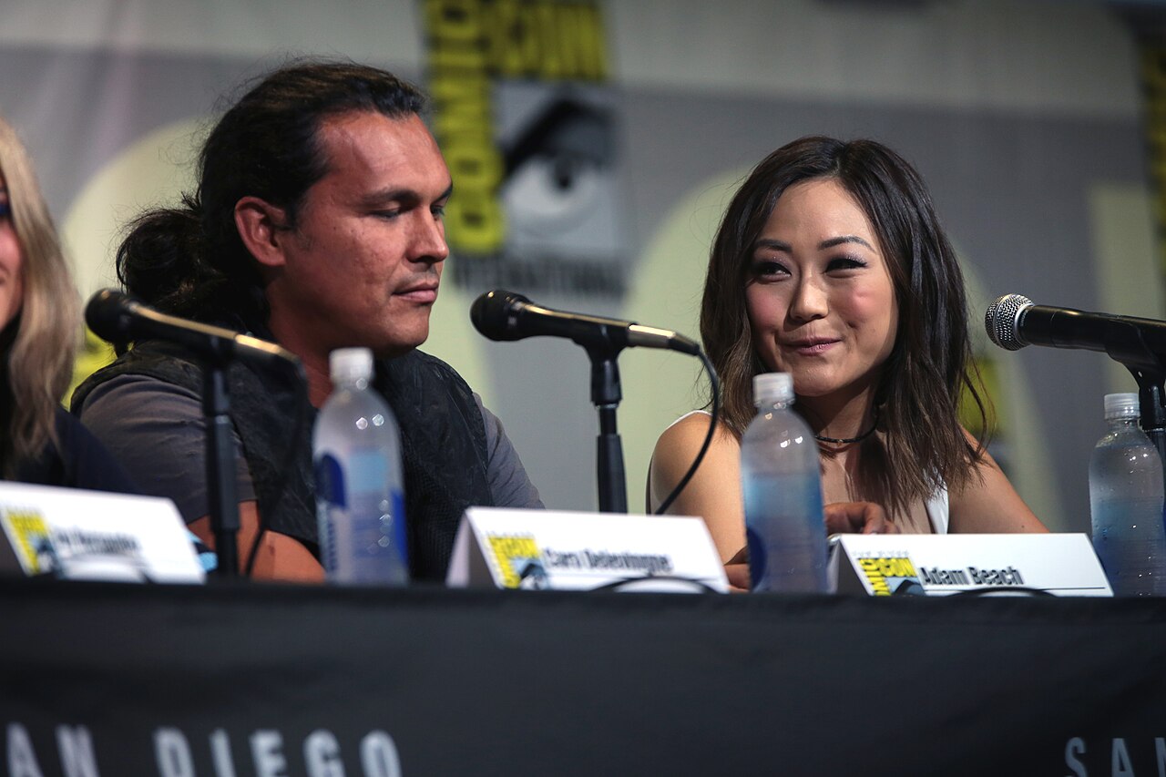 Adam Beach and Karen Fukuhara speaking at the 2016 San Diego Comic Con International, for "Suicide Squad", at the San Diego Convention Center in San Diego, Cali
