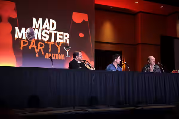Dylan McDermott and John Carroll Lynch speaking with attendees at the 2023 Mad Monster Arizona Party at the Renaissance Phoenix Glendale Hotel &amp; Spa in Glen