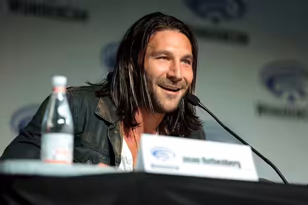 Zach McGowan speaking at the 2018 WonderCon, for "The 100", at the Anaheim Convention Center in Anaheim, California. Please attribute to Gage Skidmore if used e