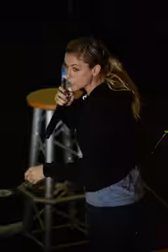 121213-N-OY799-357 ARABIAN SEA (Dec. 13, 2012) - Comedian Iliza Shlesinger performs a comedy routine for Sailors of the Nimitz-class aircraft carrier USS John C