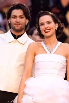Luke Grimes and Zoey Deutch presenting the movie Nouvelle Vague at the 2025 Cannes Film Festival