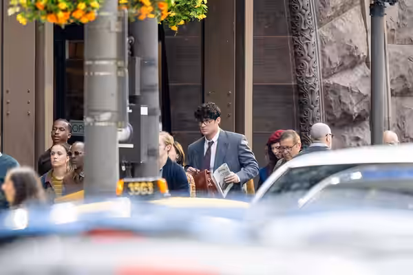 David Corenswet as Clark Kent on the set of Superman during filming in Cleveland in June 2024.