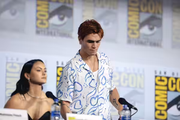 Camila Mendes and KJ Apa speaking at the 2019 San Diego Comic Con International, for "Riverdale", at the San Diego Convention Center in San Diego, California. P