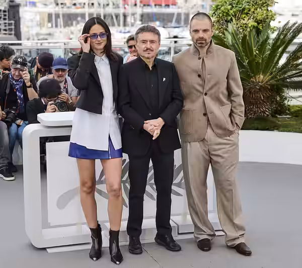 Renate Reinsve, Cristian Mungiu and Sebastian Stan pose during the "Fjord" photocall at the 79th annual Cannes Film Festival at Palais des Festivals on May 19,  (2026)