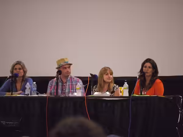 Answering questions (Voice actors at 2012 Summer BronyCon from left to right: Cathy Weseluck, Peter New, Andrea Libman, and Nicole Oliver.)
