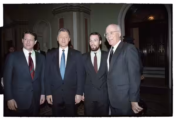 Photographs of former-President George HW Bush departing the U.S. Capitol and President William Jefferson Clinton greeting guests at the Inaugural Luncheon in t