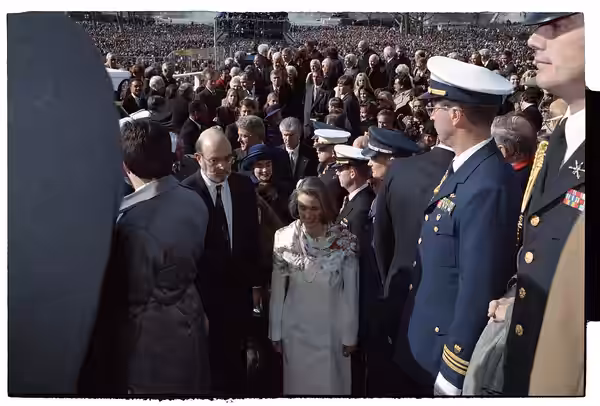 Photographs of former-President George HW Bush departing the U.S. Capitol and President William Jefferson Clinton greeting guests at the Inaugural Luncheon in t
