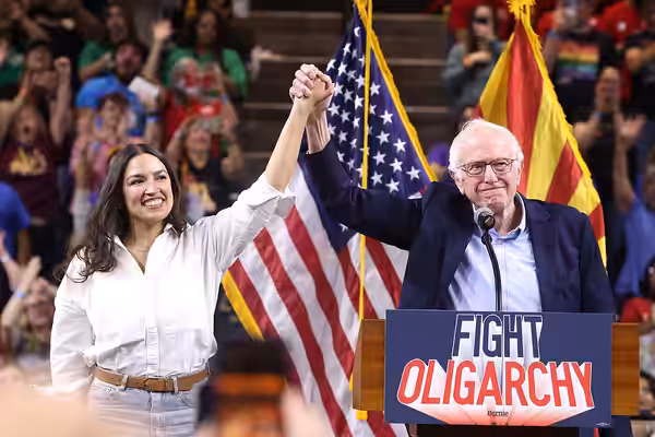 U.S. Congresswoman Alexandria Ocasio-Cortez and U.S. Senator Bernie Sanders speaking with attendees at a "Fight Oligarchy" rally at Mullett Arena in Tempe, Ariz (2025)