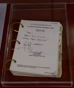 Pamela Melroy's Astronaut Support Personnel Book signed by Neil Armstrong. This photo was taken in the restoration section at the National Air and Space Museum'