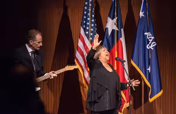 Mavis Staples, Grammy Award-winning singer and civil rights activist, and guitarist Rick Holmstrom perform "We Shall Overcome" before President Obama's keynote  (2014)