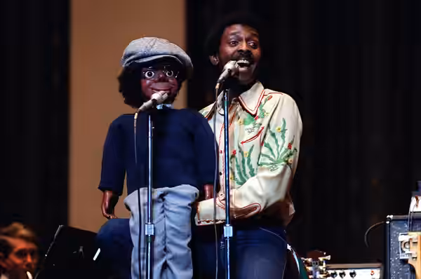 Guest performer Willie Tyler and Lester make an appearance with the U.S. Air Force band during a concert at D.A.R. Constitution Hall. (1981)