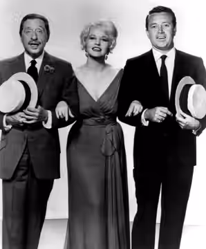 Publicity photo of songwriter/composer Harold Arlen and singers Peggy Lee and Vic Damone from the television program The DuPont Show of the Week.