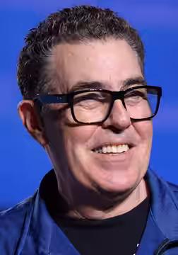 Adam Carolla speaking at an event in Palm Springs, California. (2025)