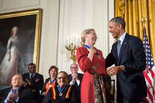 President Barack Obama presents the Presidential Medal of Freedom to Meryl Streep during a ceremony in the East Room of the White House, Nov. 24, 2014. (Officia