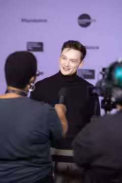 Louis Greatorex being interviewed by journalists at the 2024 Sundance Film Festival on January 18, 2024.