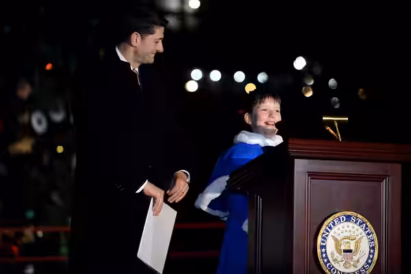 Speaker of the U.S. House of Representatives, Congressman Paul Ryan assists as 4rth grader, Brigette Harrington shares her poem during the U.S. Capitol Christma (2018)
