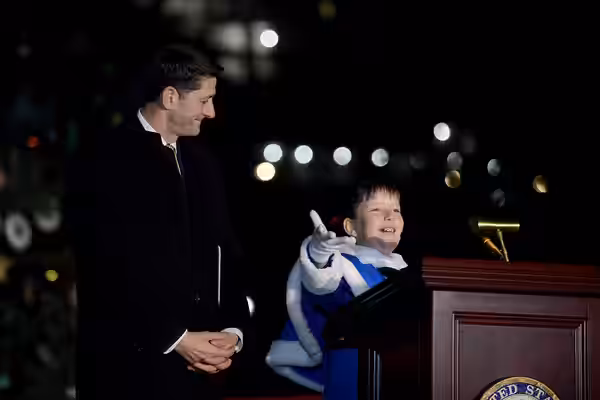 Speaker of the U.S. House of Representatives, Congressman Paul Ryan assists as 4rth grader, Brigette Harrington shares her poem during the U.S. Capitol Christma (2018)