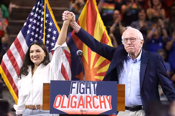 U.S. Congresswoman Alexandria Ocasio-Cortez and U.S. Senator Bernie Sanders speaking with attendees at a "Fight Oligarchy" rally at Mullett Arena in Tempe, Ariz (2025)