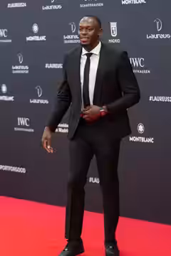 Usain Bolt, the legendary Jamaican sprinter, brings his electrifying energy to the red carpet at the 25th Laureus World Sports Awards in Madrid. An eight-time O (2024)