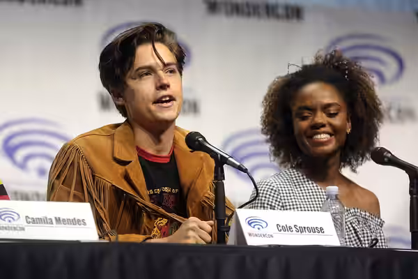 Cole Sprouse and Ashleigh Murray speaking at the 2017 WonderCon, for "Riverdale", at the Anaheim Convention Center in Anaheim, California. Please attribute to G