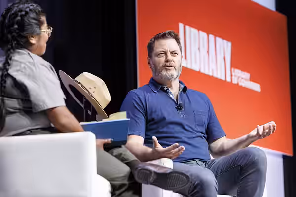 Nick Offerman discusses his recent book, "Where the Deer and the Antelope Play," with Millie Jimenez of the National Park Service at the 2022 National Book Fest