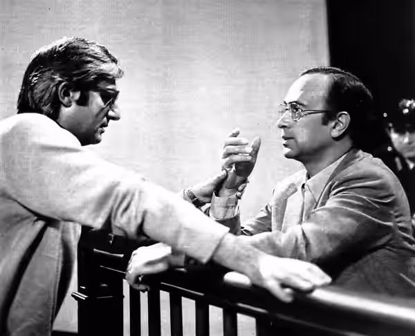 Italian director Pino Passalacqua instructing actor Franco Graziosi in the set of TV series In prima persona (1972)