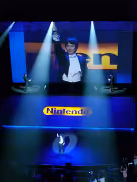 this year, Nintendo's genie took to the stage dressed as a conductor (2006)