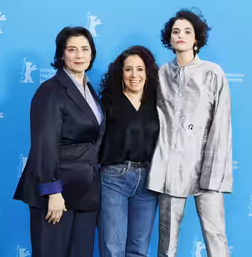 (L-R) Hiam Abbass, Director Leyla Bouzid and Eya Bouteraa pose at the "À Voix Basse" (In A Whisper) photocall at Berlinale 2026 in Berlin, Germany