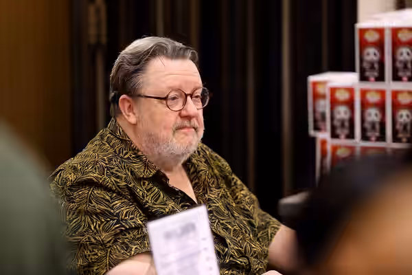 Roger L. Jackson speaking with attendees at the 2025 Amazing Art Expo at the Renaissance Phoenix Downtown Hotel in Phoenix, Arizona. Please attribute to Gage Sk