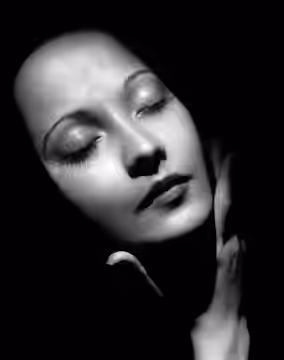 Photograph of Merle Oberon Caption reads as follows:LIFE MASKMerle Oberon, now in the film, Beloved Enemy, and soon to be seen with Charles Laughton in I, Claud (1937)