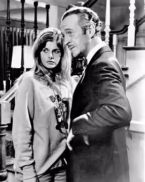 Cristina Ferrare and David Niven c. 1968 in a press photo for The Impossible Years