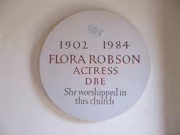 Memorial tablet to the actress Dame Flora Robson in the porch of St Nicholas Church, Brighton, East Sussex. (2019)