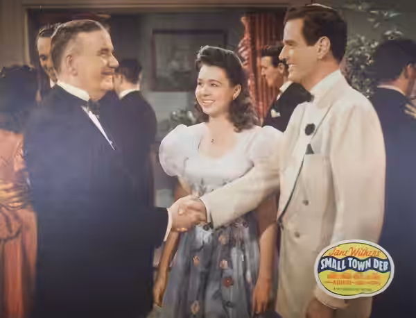 (L. to r.) Cecil Kellaway, Jane Withers, and Bruce Edwards featured on lobby card for "Small Town Deb" (1941 film)