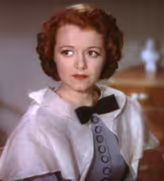 Cropped screenshot of Janet Gaynor from the film A Star is Born. Costume designed by Omar Kiam (1937)
